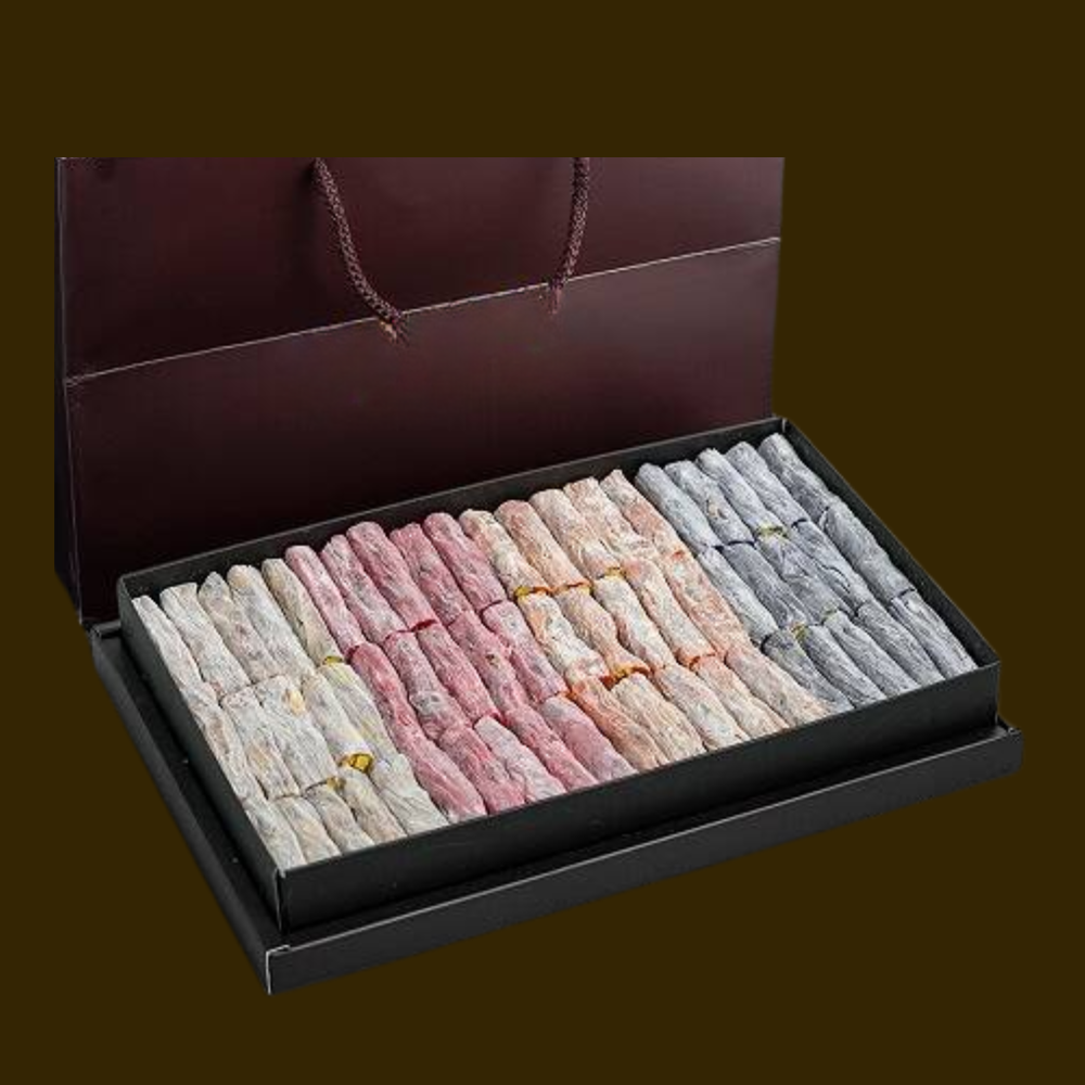 حلقوم أصابع بالفستق العنتابي مشكل بالتوت والرمان والبرتقال وسادة علبة فاخرة